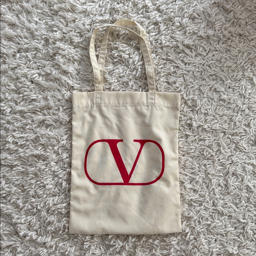 Valentino Beige Tote with Bold Red Emblem